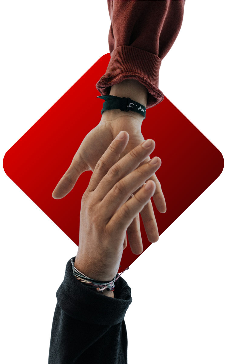 Two hands in front of a red background